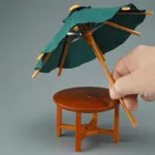 001.814/8 - Garden table with umbrella, miniature in 1:12 scale